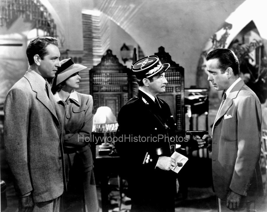 Humphrey Bogart 1942 5 With Claude Rains, Paul Henreid WM.jpg
